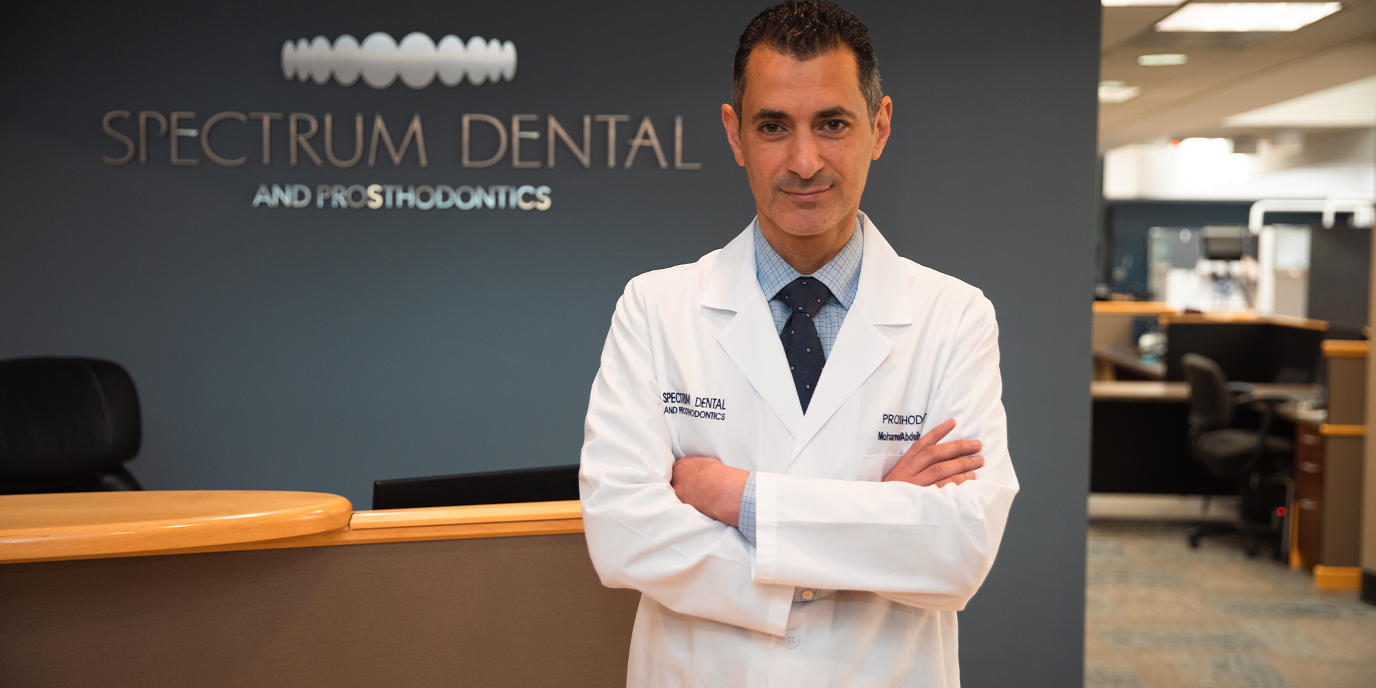 headshot of doctor within the dental practice