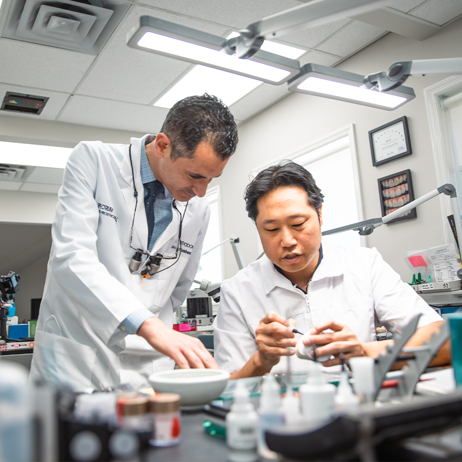 Doctor working in implant lab
